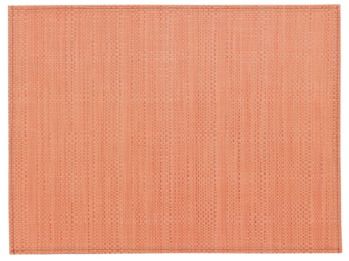 Set de table PVC tissé en couleur saumon par Winkler pour décoration de table élégante