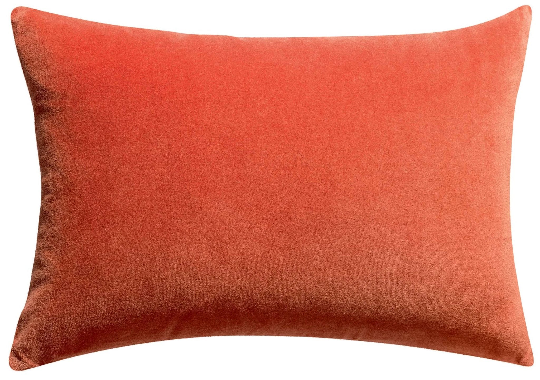Coussin décoratif en velours orange avec texture douce et finition élégante