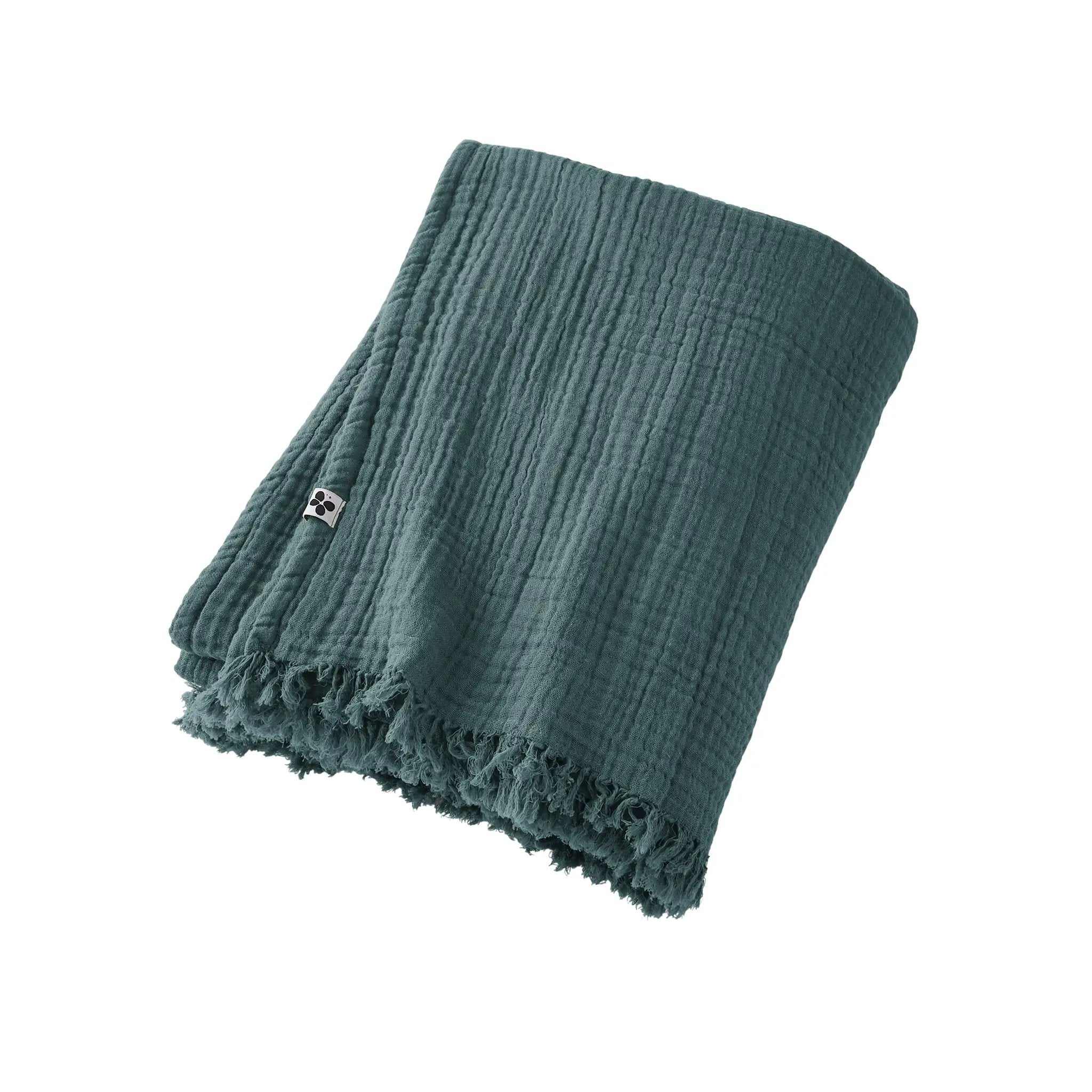 Plaid à franges vert foncé en coton doux pour une déco cosy signé L'effet papillon